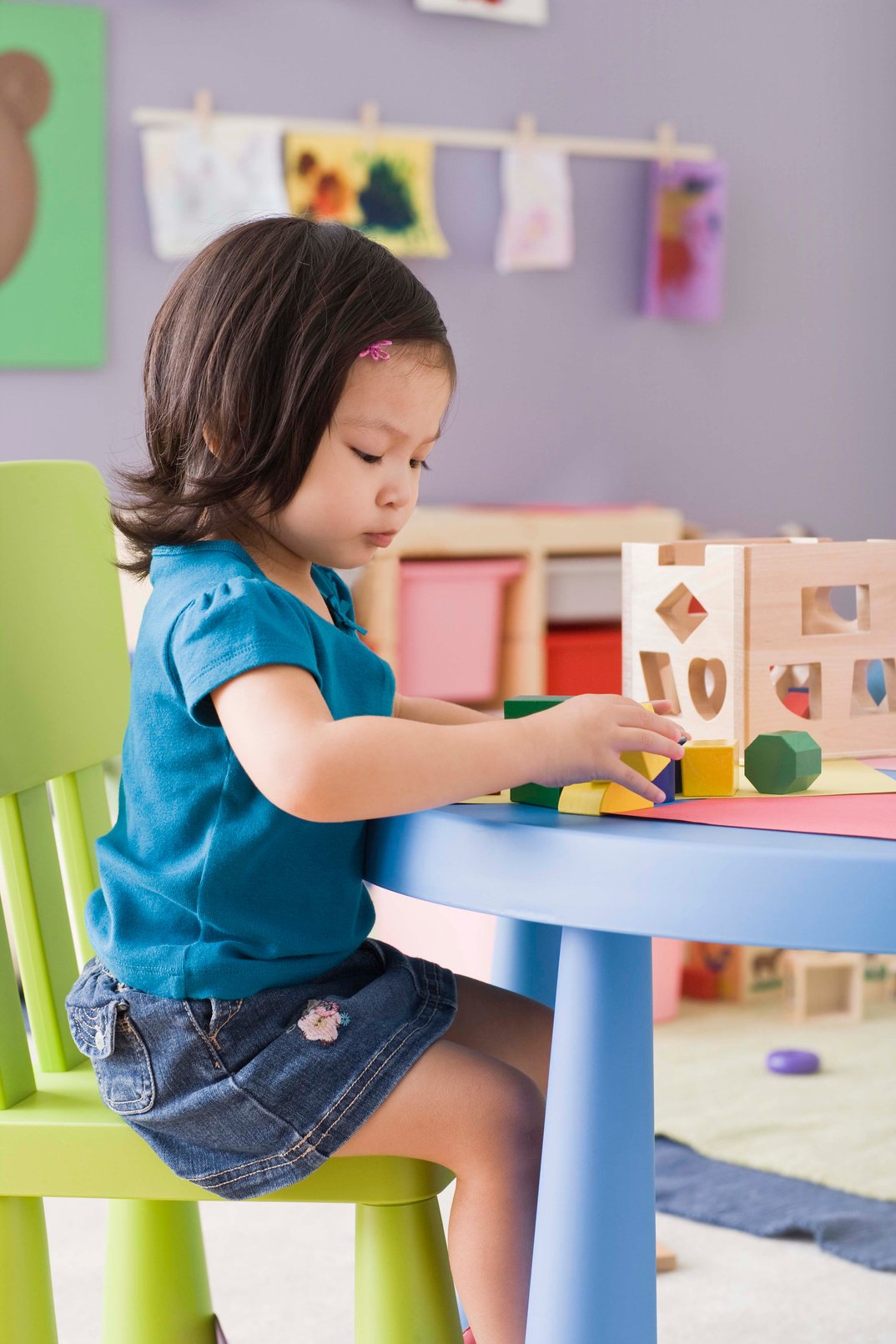 Toddler playing with blocks at daycare